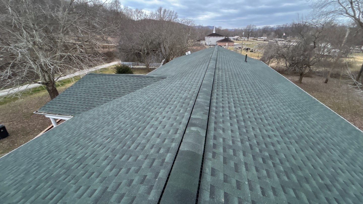 Green architectural shingles on a residential roof